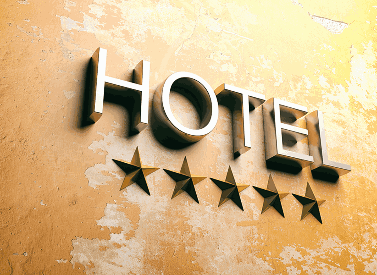 Five stars hotel sign on a stucco painted wall